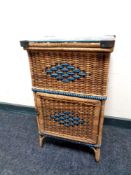 A 20th century wicker glass topped bedside cabinet,