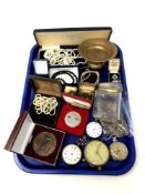 A tray containing costume jewellery, silver lidded glass dressing table pot, pocket watch chains,