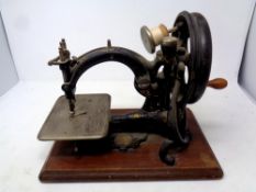 An antique Wilcox Gibbs chain stitch sewing machine