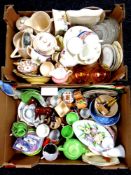 Two boxes containing assorted ceramics to include sugar basins and milk jugs, glassware,