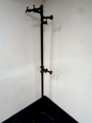 An industrial pipe and tap metal hat and coat stand