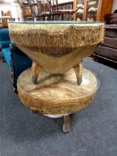 Two circular animal hide drum tables with glass tops
