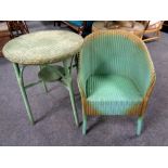 A 20th century green loom armchair and occasional table