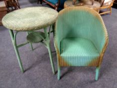 A 20th century green loom armchair and occasional table
