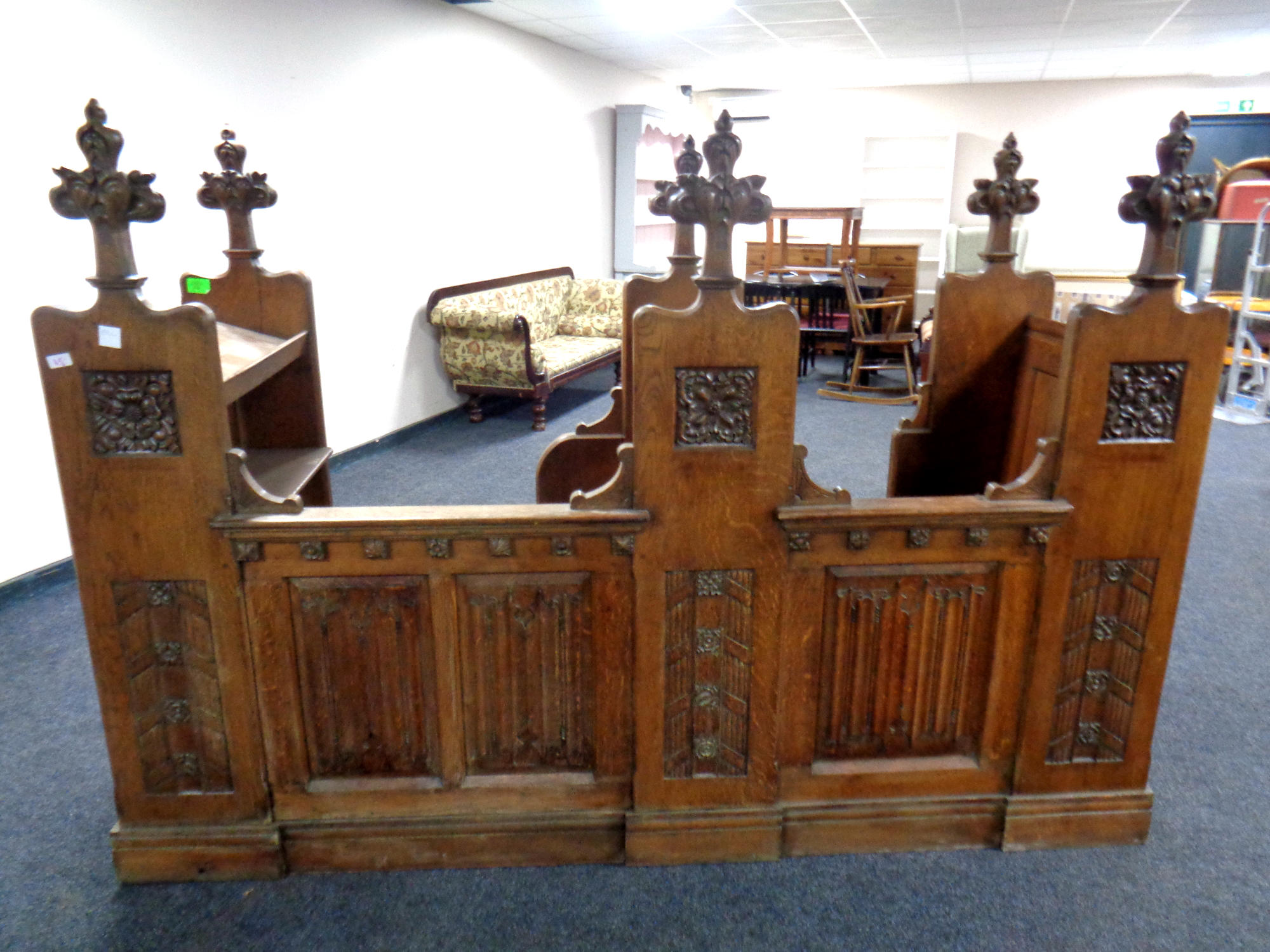 A 19th century heavily carved oak twin-section prayer stall, - Image 4 of 6