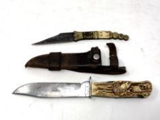 A German hunting knife in leather sheath together with a 19th century Spanish Navaja folding knife