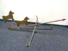 A cast iron weather vane