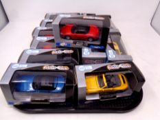 A tray containing twelve Auto Club die cast cars (boxed)