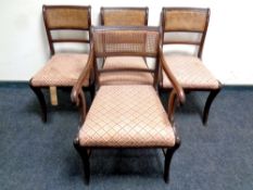 A set of four 19th century mahogany bergere backed chairs comprising of one carver and three