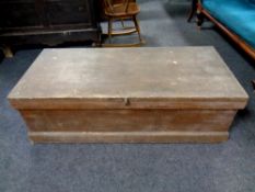 An antique pine blanket box,