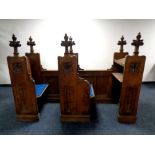 A 19th century heavily carved oak twin-section prayer stall,