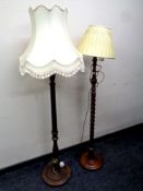 A beech wood barley twist standard lamp and shade and a further lamp with tasseled shade