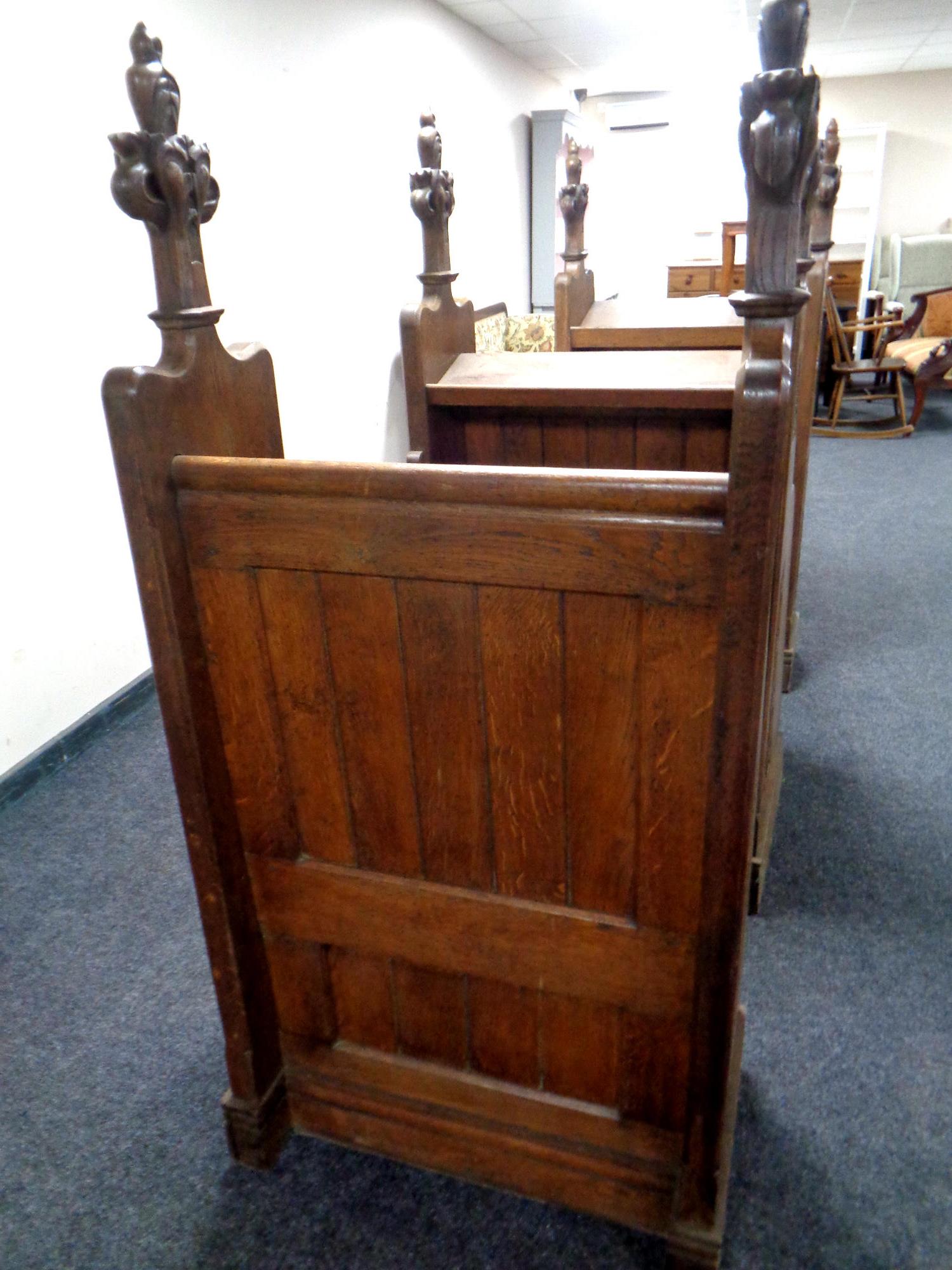 A 19th century heavily carved oak twin-section prayer stall, - Image 3 of 6