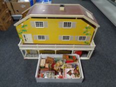 A 20th century Lundby dolls house together with a box containing a quantity of doll's furniture