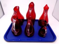 Six Whitefriars red glass jugs
