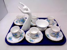 A tray containing six Royal Albert Forget Me Not tea cups and saucers together with a Royal Doulton