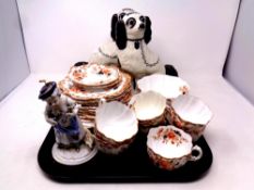 A tray containing a pair of Staffordshire dogs,