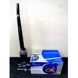 A Domotec steam cleaner with iron, boxed,