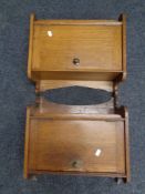 A pair of Edwardian oak wall cabinets