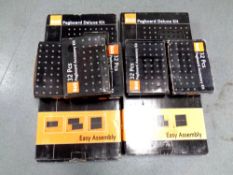 Two B & Q pegboard deluxe kits together with five accessory kits,