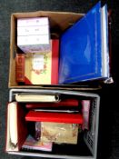 Two boxes containing a quantity of photo albums