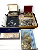 A tray containing a large quantity of costume jewellery, gilt metal pieces, bead necklaces,