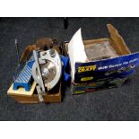 A Powercraft 600 W electric tile cutter, boxed, together with a further box containing hand saw,