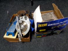 A Powercraft 600 W electric tile cutter, boxed, together with a further box containing hand saw,