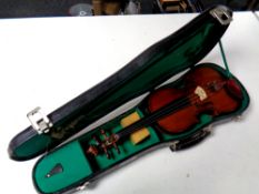 A Chinese student violin and bow in case