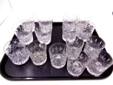 A tray containing two sets of four cut glass whisky tumblers,