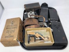 A tray containing boxed vintage student microscope, assorted cameras,