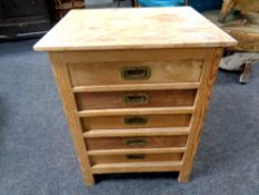 An Edwardian pine five drawer chest,