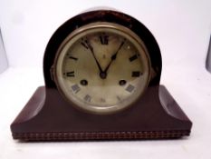 A 20th century mahogany cased mantel clock with silvered dial