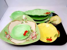 A tray containing Carlton ware leaf dishes and other dishes including Crown Devon,