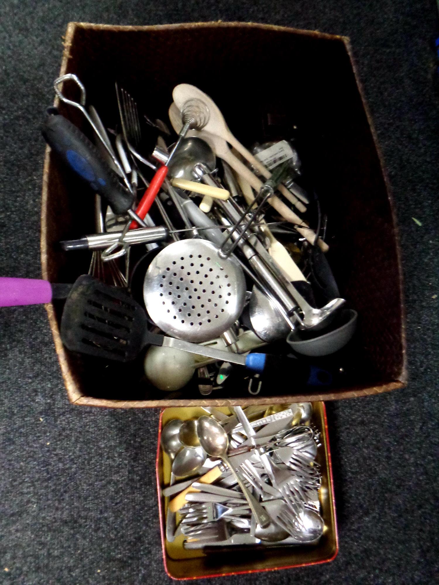 A large quantity of kitchen utensils and cutlery