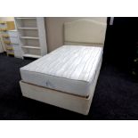 A 4' electric divan and interior with padded headboard