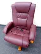 A contemporary Burgundy leather electric swivel relaxer chair