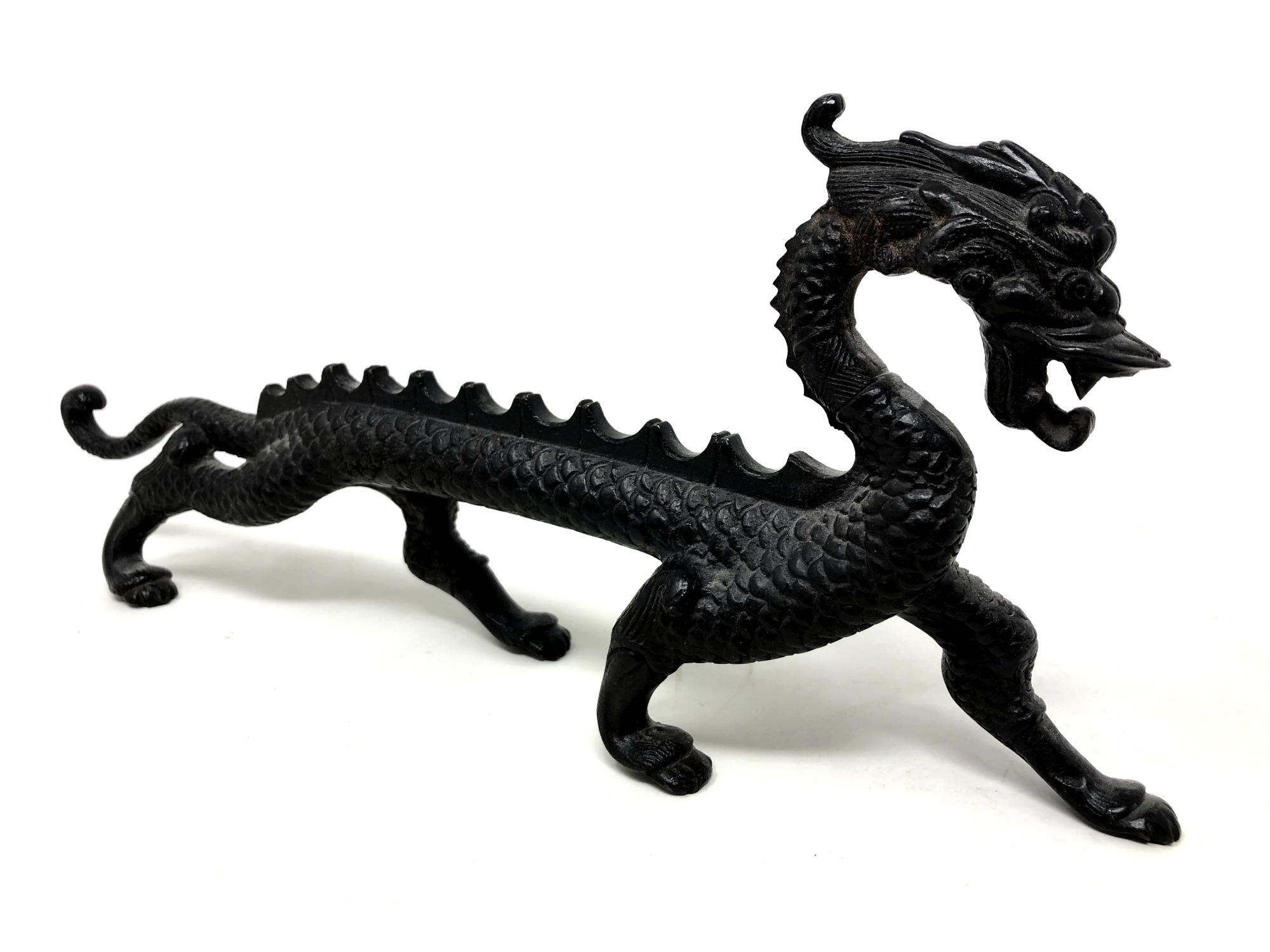 A bronze figure of a Chinese dragon,
