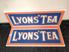 A pair of vintage glass Lyon's Tea advertisement in frames,