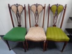 A set of three Edwardian Art Nouveau dining chairs