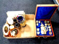 A box containing cased onyx eastern coffee set (as found), Japanese vase, framed needlework panels,