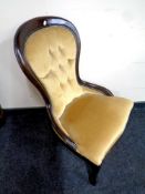 A Victorian style nursing chair in gold dralon