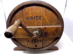 A coopered oak butter churn by Waide of Leeds