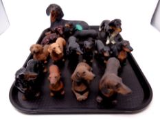 A tray containing assorted dachshund figures to include Country Artists