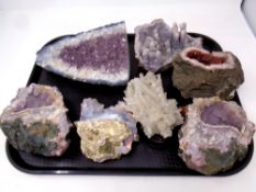 A tray containing seven rock crystal samples including amethyst