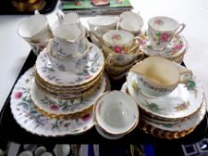 A tray containing a large quantity of miscellaneous tea china to include Royal Albert, New Chelsea,