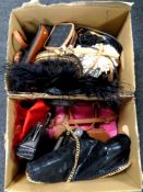 Two boxes containing a quantity of assorted handbags