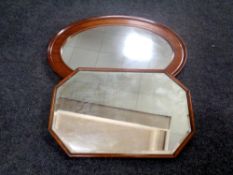 A 19th century oval mahogany framed mirror together with a further octagonal framed mirror
