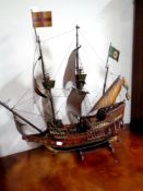 A wooden model of a three masted galleon