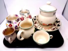 A tray containing seven pieces of hand crafted pottery to include Emma Bridgewater jugs,